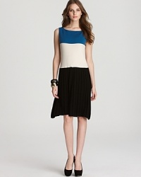 Approach the color block trend with refined sophistication in this Rachel Roy dress, flaunting a pleated skirt for a classic, feminine silhouette. Approach the color block trend with refined sophistication in this Rachel Roy dress, flaunting a pleated skirt for a classic, feminine silhouette.