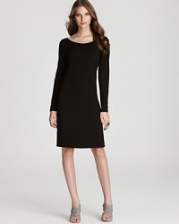 Upping your style game is gorgeously easy in this sleek Eileen Fisher dress, featuring a revealing back cutout for a sporty-chic finish. Upping your style game is gorgeously easy in this sleek Eileen Fisher dress, featuring a revealing back cutout for a sporty-chic finish.