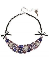 A burst of beauty. This frontal necklace from Betsey Johnson is crafted from hematite-tone mixed metal and black grosgrain ribbon. Colorful glass crystal accents provide a glistening touch. Approximate length: 15 inches + 3-inch extender. Approximate drop: 1-1/5 inches. A burst of beauty. This frontal necklace from Betsey Johnson is crafted from hematite-tone mixed metal and black grosgrain ribbon. Colorful glass crystal accents provide a glistening touch. Approximate length: 15 inches + 3-inch extender. Approximate drop: 1-1/5 inches.