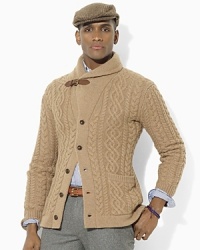 The pinnacle of relaxed refinement, a long-sleeved shawl cardigan is cable-knit from luxurious camel hair with supple leather detailing. The pinnacle of relaxed refinement, a long-sleeved shawl cardigan is cable-knit from luxurious camel hair with supple leather detailing.