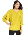 Wide ribbed detail and chic dolman sleeves give this Alfani petite sweater a flattering fit.