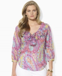 A vibrant paisley print, chic puffed sleeves and romantic ruffles add a feminine flourish to Lauren by Ralph Lauren's breezy plus size blouse in lightweight cotton. A vibrant paisley print, chic puffed sleeves and romantic ruffles add a feminine flourish to Lauren by Ralph Lauren's breezy plus size blouse in lightweight cotton.
