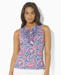 Rendered in light-as-air tissue cotton jersey, Lauren by Ralph Lauren's stylish sleeveless plus size top channels bohemian romance with eclectic paisley patterns, feminine ruffles and a chic keyhole detail. Rendered in light-as-air tissue cotton jersey, Lauren by Ralph Lauren's stylish sleeveless plus size top channels bohemian romance with eclectic paisley patterns, feminine ruffles and a chic keyhole detail.