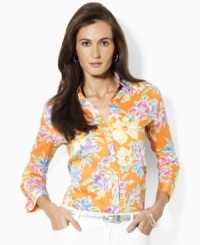 A vibrantly hued floral shirt is crafted from soft cotton sateen and finished with three-quarter sleeves and chic fold-back cuffs for a bold, tailored look, from Lauren by Ralph Lauren. A vibrantly hued floral shirt is crafted from soft cotton sateen and finished with three-quarter sleeves and chic fold-back cuffs for a bold, tailored look, from Lauren by Ralph Lauren.