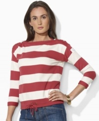 Infused with nautical inspiration, Lauren Jeans Co.'s essential French terry pullover features bold stripes, three-quarter sleeves and anchor-embossed buttons for seaworthy style. Infused with nautical inspiration, Lauren Jeans Co.'s essential French terry pullover features bold stripes, three-quarter sleeves and anchor-embossed buttons for seaworthy style.