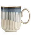 A rustic glaze, textured feel and rounded base make Denby's fluted mug a stylish go-to for cocoa, coffee and soup. Ultra-sturdy stoneware heats and reheats easily for everyday, anytime use.