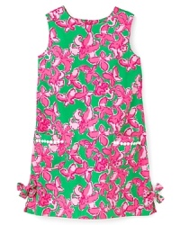 Rich floral prints and a classic shift silhouette put this sunny dress in the running for her favorite warm-weather style. Rich floral prints and a classic shift silhouette put this sunny dress in the running for her favorite warm-weather style.