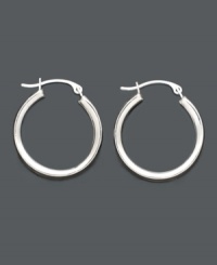 Who couldn't use a little reliability? Turn to these polished 14k white gold hoops for your perfect everyday accessory. Approximate diameter: 3/4 inch.