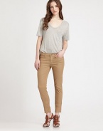 Slim, sexy and fitted, this sleek silhouette features a bleached ombre finish and a dusting of glitter, cropped just above the ankle.THE FITSkinny fitRise, about 7½Inseam, about 26THE DETAILSZip flyFive-pocket style98% cotton/2% spandexMachine washMade in USA of imported fabricModel shown is 5'9½ (176cm) wearing US size 4.