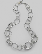 Gently hammered freeform links of sterling silver in an array of sizes and shapes give a classic chain a whole new look. Sterling silver Length, about 23 Toggle clasp Imported