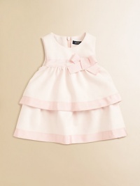This sweet confection features two charming tiers trimmed with silky ribbon and a gorgeous bow detail.Scoop neckConcealed back zip closureSleevelessTwo tiers with ribbon trimFalls above knee59% polyester/37% viscose/4% elastaneMachine washImported This sweet confection features two charming tiers trimmed with silky ribbon and a gorgeous bow detail.Scoop neckConcealed back zip closureSleevelessTwo tiers with ribbon trimFalls above knee59% polyester/37% viscose/4% elastaneMachine washImported