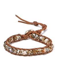 Simple yet eclectic. This Chan Luu leather wrap bracelet refines bohemian style with its mix of semi-precious gemstones and striking crystals. Simple yet eclectic. This Chan Luu leather wrap bracelet refines bohemian style with its mix of semi-precious gemstones and striking crystals.