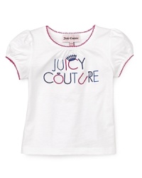Juicy Couture updates its logo tee with puff sleeves and scallop trim. Juicy Couture updates its logo tee with puff sleeves and scallop trim.
