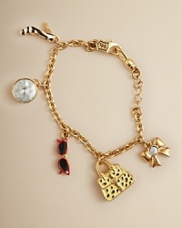 All the accessories a trendy girl needs for a fashionable Saturday with friends twinkle from this adorably chic charm bracelet. All the accessories a trendy girl needs for a fashionable Saturday with friends twinkle from this adorably chic charm bracelet.