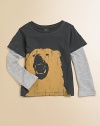 A long-sleeved, layered-look cotton tee is wild and wooly with a fierce bear graphic.CrewneckLong layered-look sleevesPullover styleCottonMachine washImported