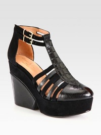 Suede and crocodile-embossed leather combine in this peep toe silhouette topped with double adjustable ankle straps. Suede and leather-covered wedge, 4 (100mm)Suede-covered platform, 1½ (40mm)Compares to a 2½ heel (65mm)Crocodile-embossed leather and suede upperPeep toeLeather liningRubber solePadded insoleMade in France Suede and crocodile-embossed leather combine in this peep toe silhouette topped with double adjustable ankle straps. Suede and leather-covered wedge, 4 (100mm)Suede-covered platform, 1½ (40mm)Compares to a 2½ heel (65mm)Crocodile-embossed leather and suede upperPeep toeLeather liningRubber solePadded insoleMade in France