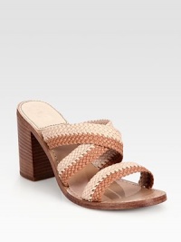 Brilliantly braided leather slide in a two-tone design, lifted by a wide, stacked heel. Stacked heel, 3 (75mm)Leather upperLeather lining and solePadded insoleImportedOUR FIT MODEL RECOMMENDS ordering one size up as this style runs small. 