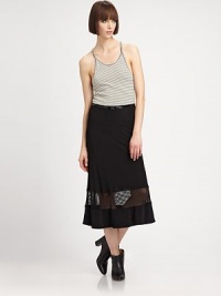 This comfortable one-piece has a touch of edgy style with a shiny belted waist and sexy mesh details. Scoopneck with thin spaghetti strapsSleevelessStriped bodiceNarrow belted waistA-line skirt with semi-sheer mesh bandAbout 32 from natural waist60% cotton/26% polyester/8% linen/6% viscoseDry cleanMade in USAModel shown is 5'10.5 (179cm) wearing US size Small. This comfortable one-piece has a touch of edgy style with a shiny belted waist and sexy mesh details. Scoopneck with thin spaghetti strapsSleevelessStriped bodiceNarrow belted waistA-line skirt with semi-sheer mesh bandAbout 32 from natural waist60% cotton/26% polyester/8% linen/6% viscoseDry cleanMade in USAModel shown is 5'10.5 (179cm) wearing US size Small.
