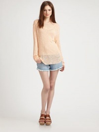 Dropped shoulders, long dolman sleeves and slight distressing add a dab of slouchy-chic to this lengthy, lightweight sweater. ScoopneckDropped shouldersLong dolman sleevesDistressed cuffs and hemLonger length hits below the hips95% rayon/5% spandexDry cleanMade in USAModel shown is 5'10 (177cm) wearing US size XS/S. Dropped shoulders, long dolman sleeves and slight distressing add a dab of slouchy-chic to this lengthy, lightweight sweater. ScoopneckDropped shouldersLong dolman sleevesDistressed cuffs and hemLonger length hits below the hips95% rayon/5% spandexDry cleanMade in USAModel shown is 5'10 (177cm) wearing US size XS/S.