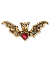 Take a bite out of the night with this chic stretch ring from Betsey Johnson. The bat wing design is adorned with crystal accents, a pink crystal heart and a gold tone segmented body. Stretches to fit finger. Crafted in antiqued gold tone mixed metal. Size 7-1/2. Take a bite out of the night with this chic stretch ring from Betsey Johnson. The bat wing design is adorned with crystal accents, a pink crystal heart and a gold tone segmented body. Stretches to fit finger. Crafted in antiqued gold tone mixed metal. Size 7-1/2.