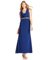 Xscape's evening gown is elevated by a dramatic cowl neckline at the front and back and a beautiful beaded empire waist. Xscape's evening gown is elevated by a dramatic cowl neckline at the front and back and a beautiful beaded empire waist.