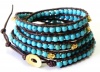 Chan Luu Turquoise Gold Skull Wrap Bracelet on Brown Leather