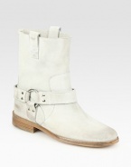 Edgy suede style with a rocker-chic, wrap-around buckle, slightly stacked heel and two pull tabs. Stacked heel, 1 (25mm)Suede upperPull-on styleLeather lining and solePadded insoleMade in ItalyOUR FIT MODEL RECOMMENDS ordering true size. 