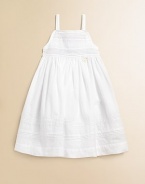 This angelic A-line silhouette is topped with pintucked and embroidered details.SquareneckSpaghetti strapsBack buttonsFull skirtCottonMachine washImported Please note: Number of buttons may vary depending on size ordered. 