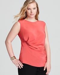 Petal-soft silk lends vibrant movement to a draped Lafayette 148 New York blouse. Garnish with gold accents for a captivating look. Petal-soft silk lends vibrant movement to a draped Lafayette 148 New York blouse. Garnish with gold accents for a captivating look.
