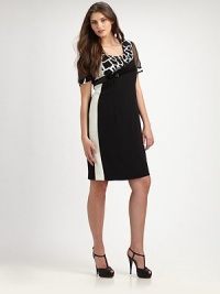Princess seams and sequins contrast perfectly with giraffe-print details and athletic-inspired, contrast stripes to create a unique design. Sheer short sleevesPrincess seamsAsymmetrical sequin detailContrast trimBack zipperFully linedAbout 23 from natural waistPolyesterDry cleanMade in Italy Princess seams and sequins contrast perfectly with giraffe-print details and athletic-inspired, contrast stripes to create a unique design. Sheer short sleevesPrincess seamsAsymmetrical sequin detailContrast trimBack zipperFully linedAbout 23 from natural waistPolyesterDry cleanMade in Italy