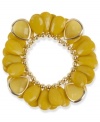 Bright colors make the season. Haskell's shaky bracelet combines teardrop-shaped chartreuse acrylic beads with gold tone metal details. Set in gold tone mixed metal. Bracelet stretches to fit wrist. Approximate length: 7-1/2 inches.