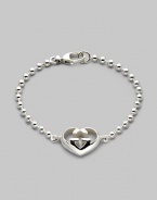 From the Love Britt Collection. Signature interlocking G in an iconic heart shape accents the wrist beautifully. Sterling silver Width of heart, about ¾ Length, about 6½ Lobster clasp closure Made in Italy 