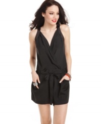 A silky romper that seamlessly transitions into the night, this style from GUESS? is the epitome of sleek-chic! With its wrap-style top and slouchy-cool fit, this one-piece is the ideal mate to a pair of sexy heels! A silky romper that seamlessly transitions into the night, this style from GUESS? is the epitome of sleek-chic! With its wrap-style top and slouchy-cool fit, this one-piece is the ideal mate to a pair of sexy heels!