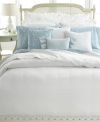 Luxurious white-on-white quilted details lend sumptuous texture to this Spring Hill quilt from Lauren Ralph Lauren. Finished with scalloped edges. Reverses to solid.