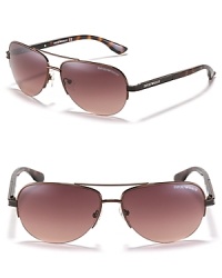 Chic rimless aviator sunglasses with a double bar design and printed arms. Chic rimless aviator sunglasses with a double bar design and printed arms.