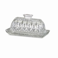 The new Lismore Covered Butter Dish is a great addition to the Lismore tableware category. It features the fabulous signature facets and promises to make even the most mundane breakfast memorable. Created to complement all the other Lismore serving pieces, the new covered butter adds a jewel-like luster to the table with diamond cuts surrounding the top surmounted by a solitaire handle. It promises to refract the morning light long after the toast is buttered and to catch the candlelight at every gracious dinner. The new Lismore Covered Butter Dish is a great addition to the Lismore tableware category. It features the fabulous signature facets and promises to make even the most mundane breakfast memorable. Created to complement all the other Lismore serving pieces, the new covered butter adds a jewel-like luster to the table with diamond cuts surrounding the top surmounted by a solitaire handle. It promises to refract the morning light long after the toast is buttered and to catch the candlelight at every gracious dinner.