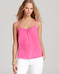The classic Juicy Couture tank gets an elegant new attitude with a fresh shot of hue-happy silk. A relaxed cut pairs with a ruched neckline for a modern feel. The classic Juicy Couture tank gets an elegant new attitude with a fresh shot of hue-happy silk. A relaxed cut pairs with a ruched neckline for a modern feel.