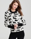 Black kittens prowl about this playful 10 Crosby Derek Lam sweater--the purr-fect statement piece for fall.