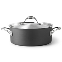 Calphalon Dutch oven. This pot is perfect for slow simmering soups, steaming a shellfish feast or for baking a hearty casserole. Crafted in hard anodized aluminum to guarantee superior heat conductivity. A nonstick interior provides low-fat cooking and quick clean ups. Full capacity indicator line prevents messy spills. Riveted handles. Domed tempered glass cover for easy monitoring. Calphalon Dutch oven. This pot is perfect for slow simmering soups, steaming a shellfish feast or for baking a hearty casserole. Crafted in hard anodized aluminum to guarantee superior heat conductivity. A nonstick interior provides low-fat cooking and quick clean ups. Full capacity indicator line prevents messy spills. Riveted handles. Domed tempered glass cover for easy monitoring.