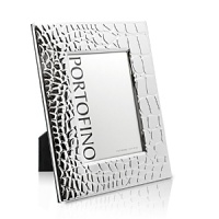 Featuring a wide crocodile-patterned border in gleaming plated silver, this unique frame by Argento gives favorite photos a fresh, modern look. Featuring a wide crocodile-patterned border in gleaming plated silver, this unique frame by Argento gives favorite photos a fresh, modern look.