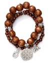Layers of wooden beads and silver charms on Good Charma's bracelets are in perfect step with this season's global influences. Make this set your exotic embellishment of choice.