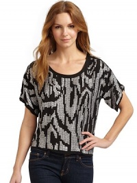 Lightweight silk chiffon with a relaxed shape and a jagged pattern of sequins, is the epitome of nonchalant glam.Scoopneck Pullover style Short sleeves About 20½ from shoulder to hem Silk; dry clean Imported Lightweight silk chiffon with a relaxed shape and a jagged pattern of sequins, is the epitome of nonchalant glam.Scoopneck Pullover style Short sleeves About 20½ from shoulder to hem Silk; dry clean Imported
