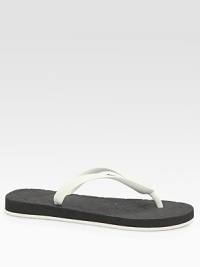 Rubber flat with a thong front and comfortable foam-blend sole. Rubber upperRubber liningRubber and foam solePadded insoleMade in ItalyOUR FIT MODEL RECOMMENDS ordering true whole size; ½ sizes should order the next whole size down. Rubber flat with a thong front and comfortable foam-blend sole. Rubber upperRubber liningRubber and foam solePadded insoleMade in ItalyOUR FIT MODEL RECOMMENDS ordering true whole size; ½ sizes should order the next whole size down.
