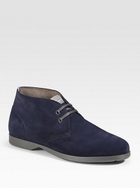 An ankle-high profile with two-eyelet construction in rich suede. Leather lining Padded insole Rubber sole Made in Italy An ankle-high profile with two-eyelet construction in rich suede. Leather lining Padded insole Rubber sole Made in Italy