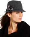 Reminiscent of the silver screen divas from the '40s, this fedora design from Nine West speaks classic style. Soft wool felt is topped off with a romantic floral accent, for a look that's altogether alluring.