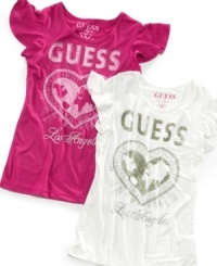 Cosmopolitan chic. The sparkly graphic on this lightweight tee from Guess makes it a look she can rock no matter what destination she's in. Cosmopolitan chic. The sparkly graphic on this lightweight tee from Guess makes it a look she can rock no matter what destination she's in.
