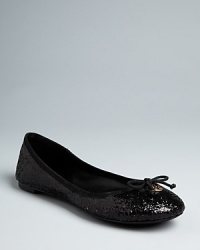 Basic ballet flats get a dose of glam with glitter uppers in this Tory Burch design. They're simply sparkling. Basic ballet flats get a dose of glam with glitter uppers in this Tory Burch design. They're simply sparkling.