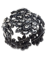 Fashion that goes off like a big bang. This stretch bracelet lends a gorgeous touch to your outfits with plastic stone accents in a starburst design. Stretches to fit wrist. Crafted in hematite tone mixed metal. Approximate diameter: 2-1/2 inches. Fashion that goes off like a big bang. This stretch bracelet lends a gorgeous touch to your outfits with plastic stone accents in a starburst design. Stretches to fit wrist. Crafted in hematite tone mixed metal. Approximate diameter: 2-1/2 inches.