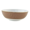 Embellished with an organically complex basket weave pattern and rendered in gold-tipped earthy hues, the Reynaud Tresor large salad bowl lends boho-chic sophistication to the dining table.