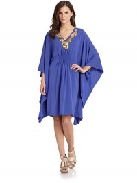 THE LOOKHammered metal pebble accents at V-neckSmocked center elastic waistThree-quarter length caftan sleevesTHE FITAbout 40 from shoulder to hemTHE MATERIAL70% rayon/24% polyester/6% spandexCARE & ORIGINDry cleanImportedModel shown is 5'9½ (176cm) wearing US size Small. THE LOOKHammered metal pebble accents at V-neckSmocked center elastic waistThree-quarter length caftan sleevesTHE FITAbout 40 from shoulder to hemTHE MATERIAL70% rayon/24% polyester/6% spandexCARE & ORIGINDry cleanImportedModel shown is 5'9½ (176cm) wearing US size Small.